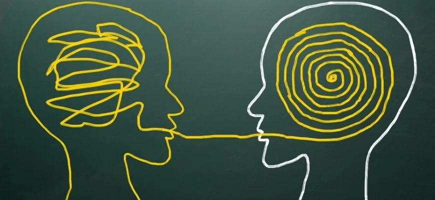 Cartoon with random 'thread' shown in one person's head, spilling out to someone where it is arranged in a spiral ie. organized